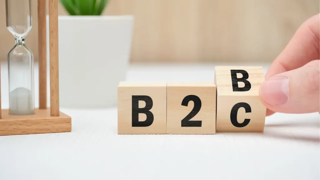 Arte ilustrativa com blocos de madeira escrito "B2C".